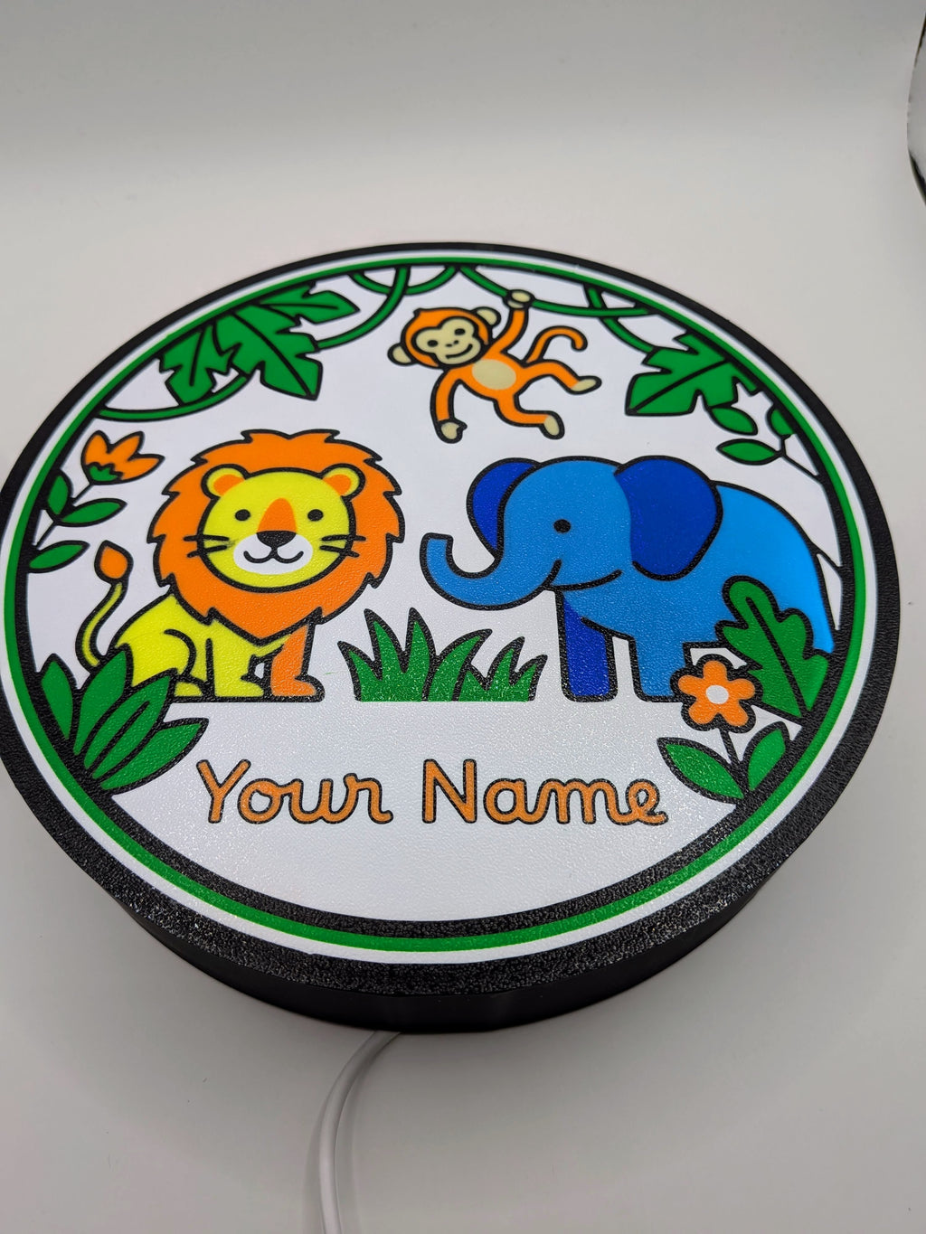 Lampada LED rotonda con leone, elefante e scimmia, bordo verde