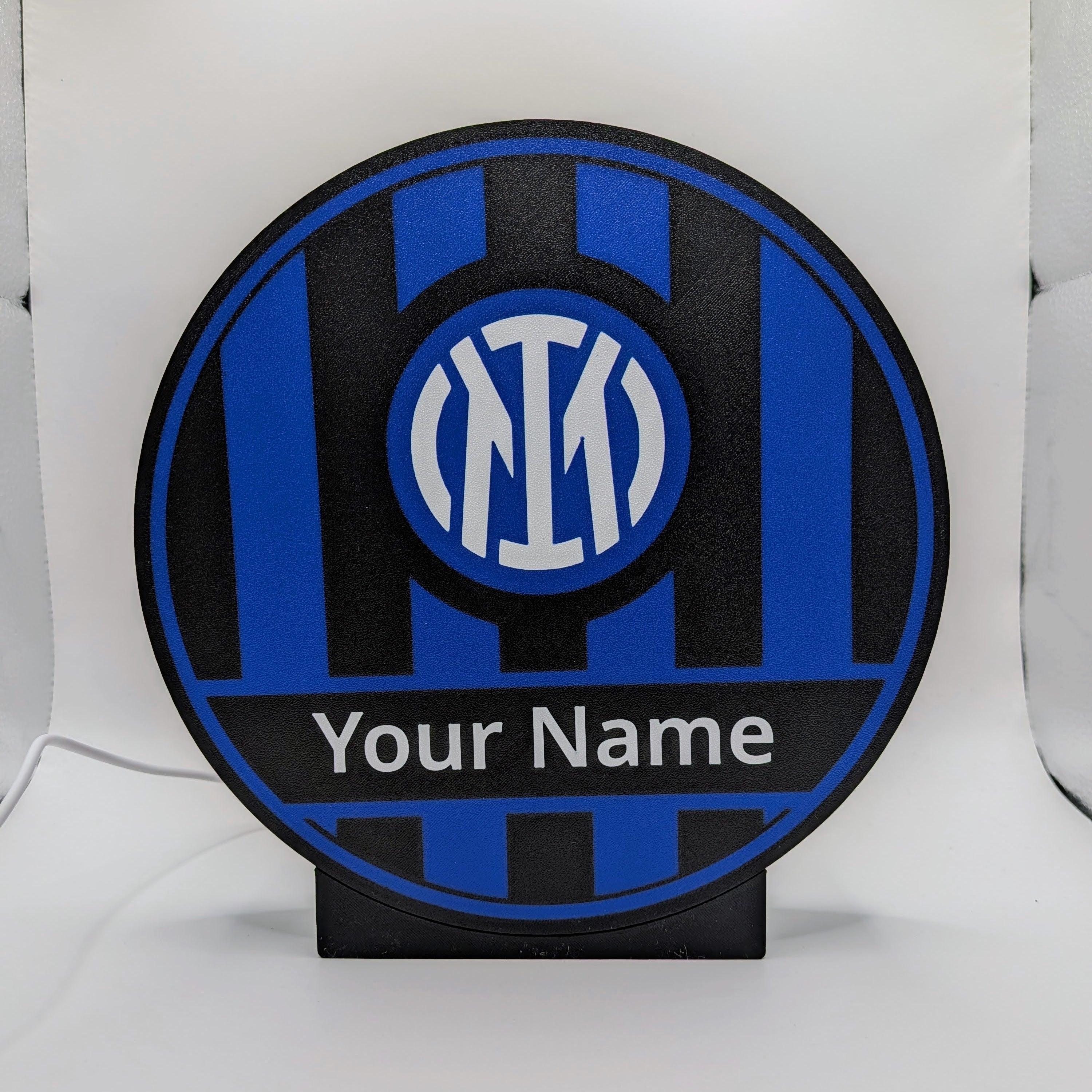 Lampada LED circolare personalizzata con logo e “Your Name”, vista da vicino