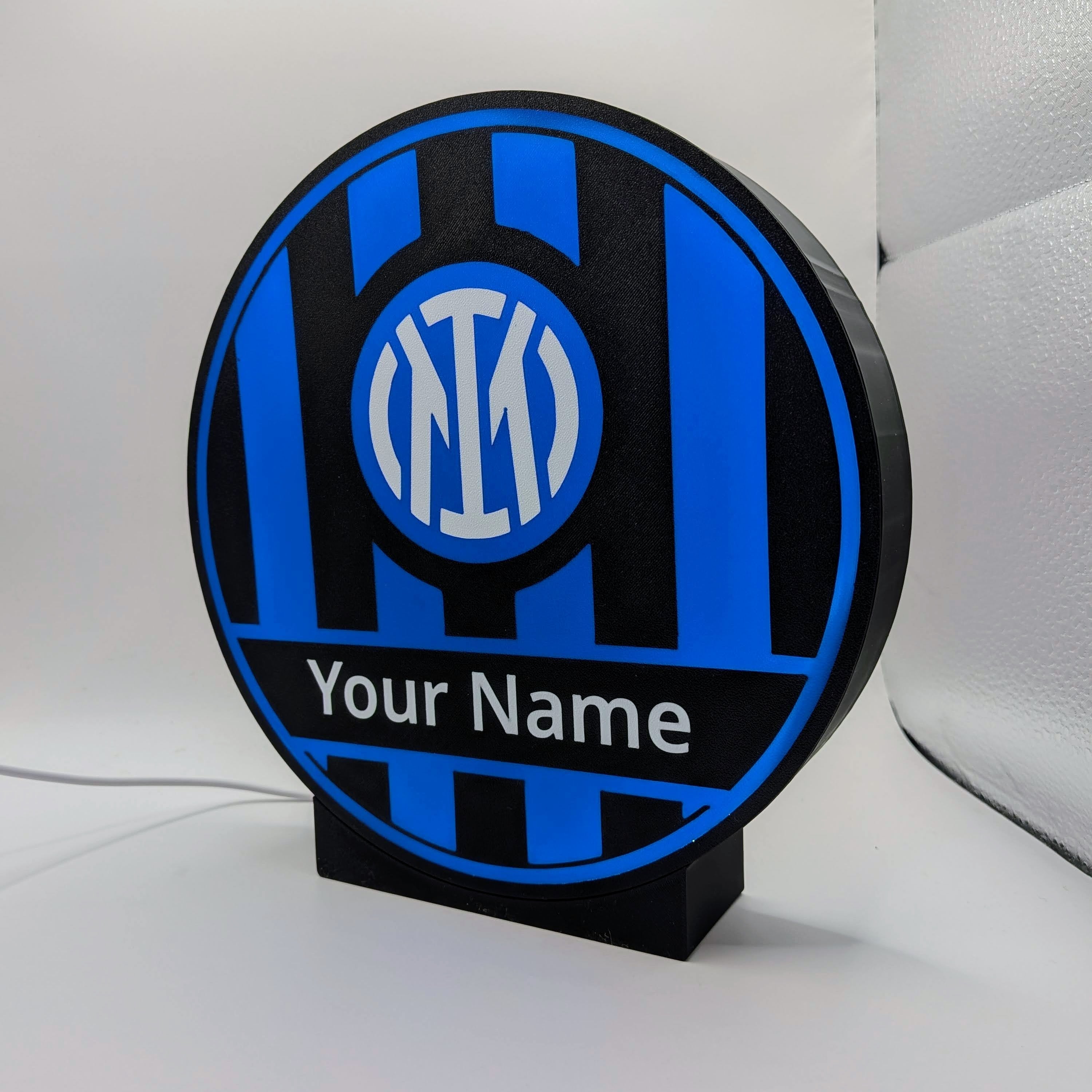 Lightbox LED rotonda Inter con scritta Your Name, luce blu, supporto nero