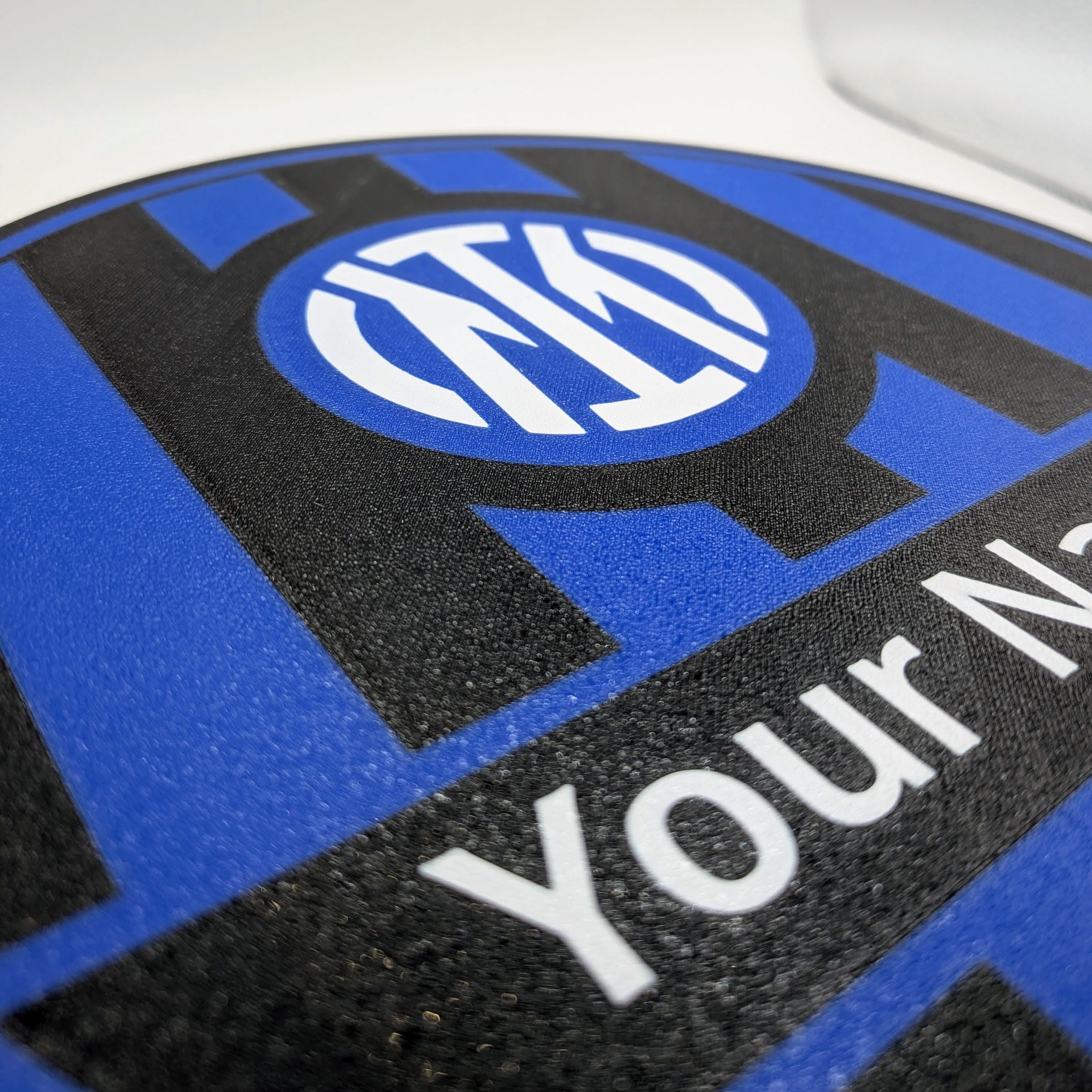 Lightbox LED personalizzata con logo blu e scritta bianca su pannello nero