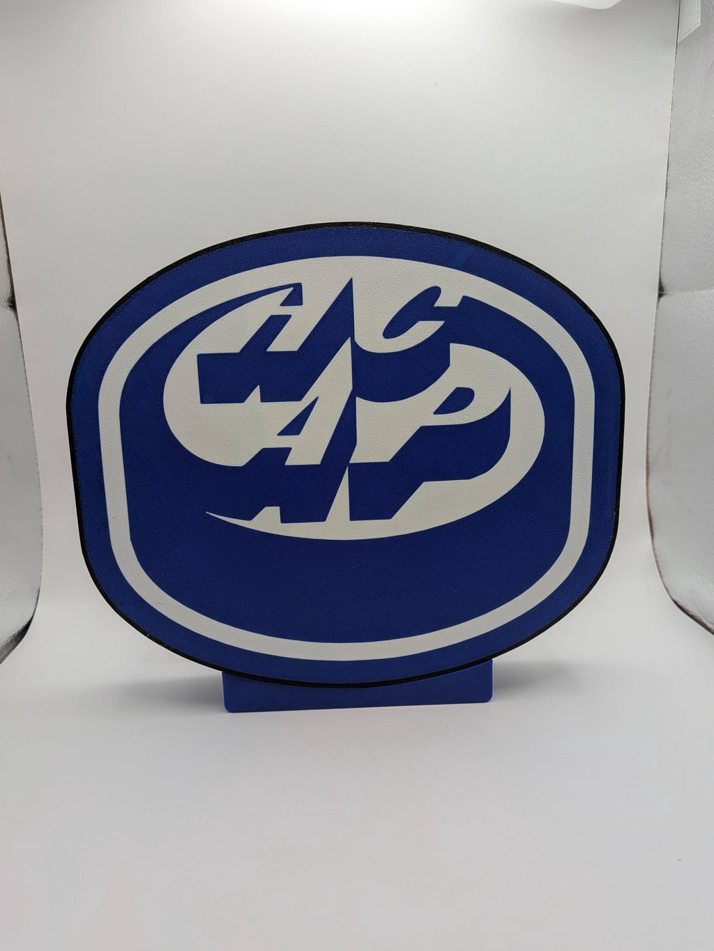 Lampada LED lightbox rotonda blu con logo hockey, base in plastica e contorno bianco