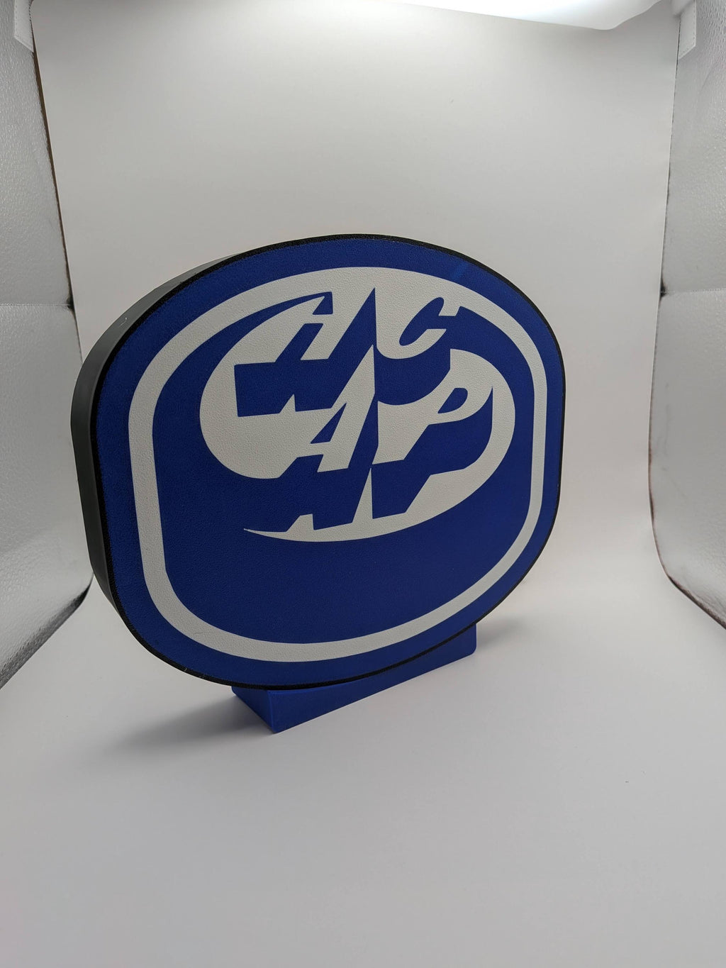 Lampada LED lightbox rotonda con logo hockey blu e bianco, base piccola