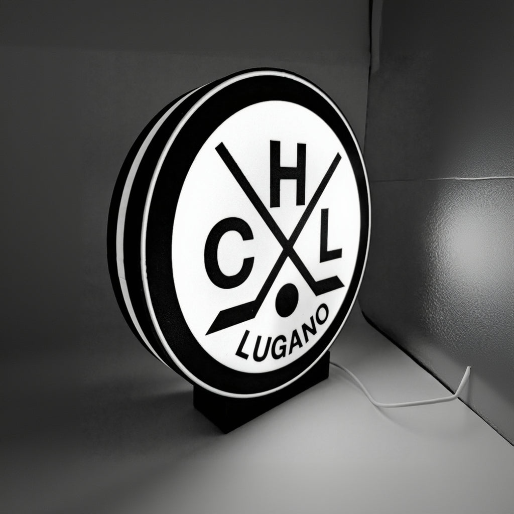 Lampada LED circolare HC Lugano con logo bianco e corona nera