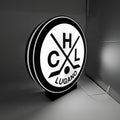 Lampada LED circolare HC Lugano con logo bianco e corona nera