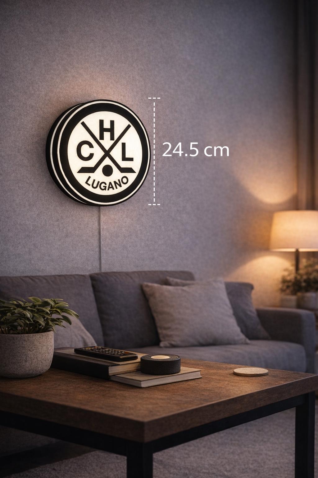 Round LED lightbox with Lugano hockey emblem and circular size marker showing 24.5 cm