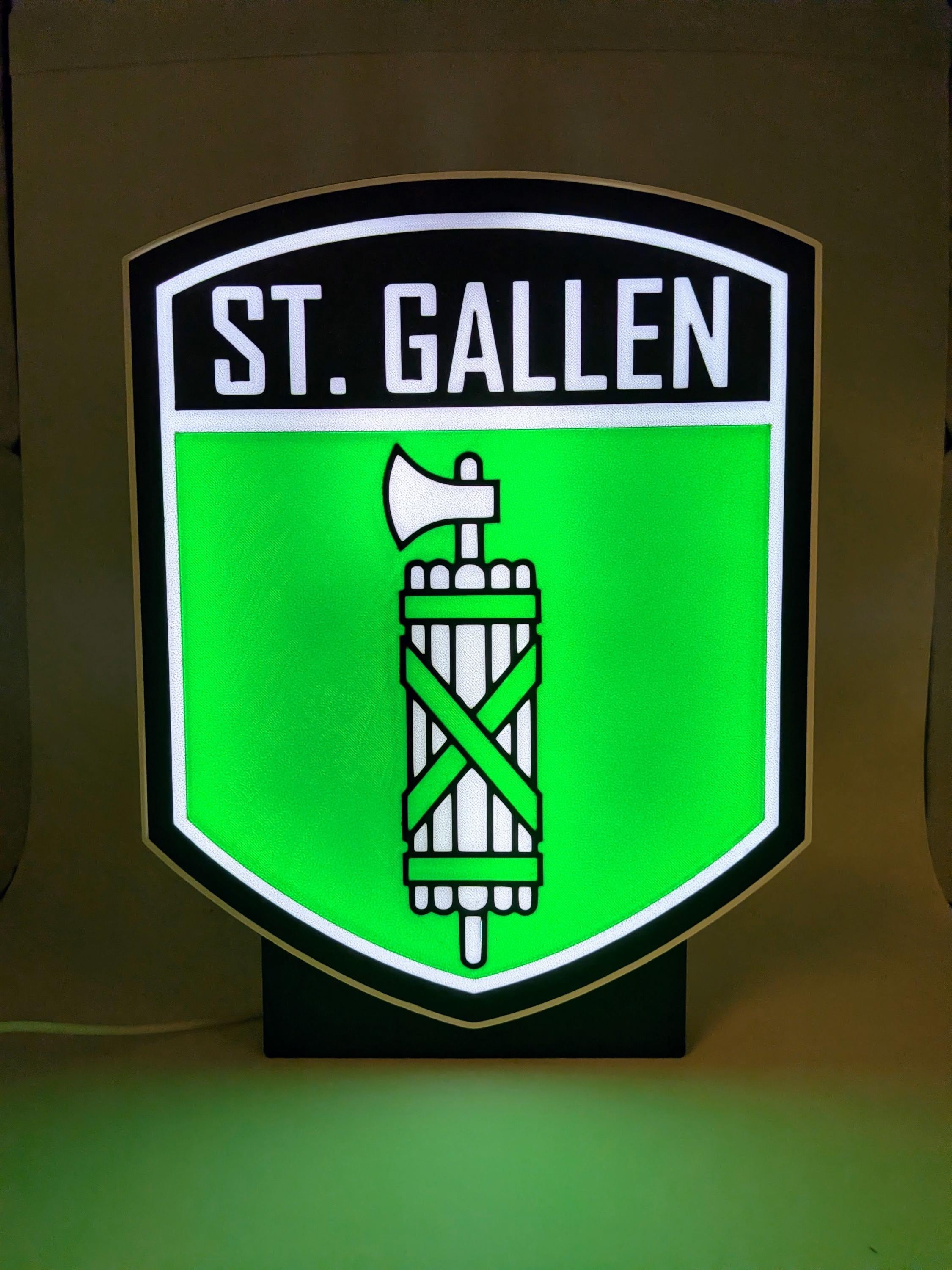 Lampada LED lightbox con stemma ST. Gallen su sfondo verde, cornice bianca