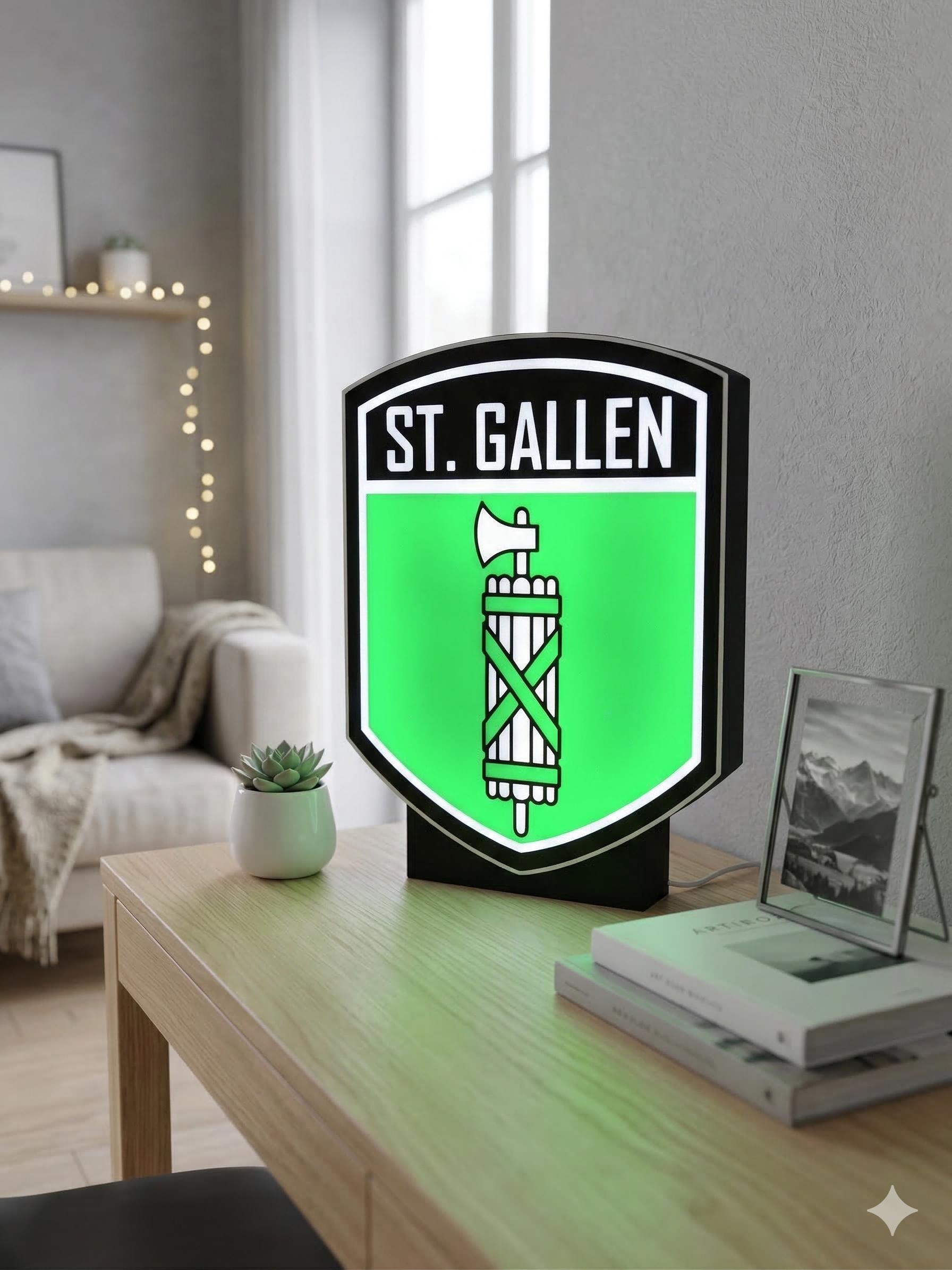 LED lightbox lamp with St. Gallen crest, green illuminated shield on black base