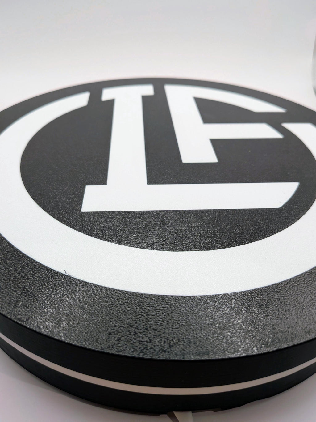 Lightbox LED circolare con logo FC Lugano bianco e base nera