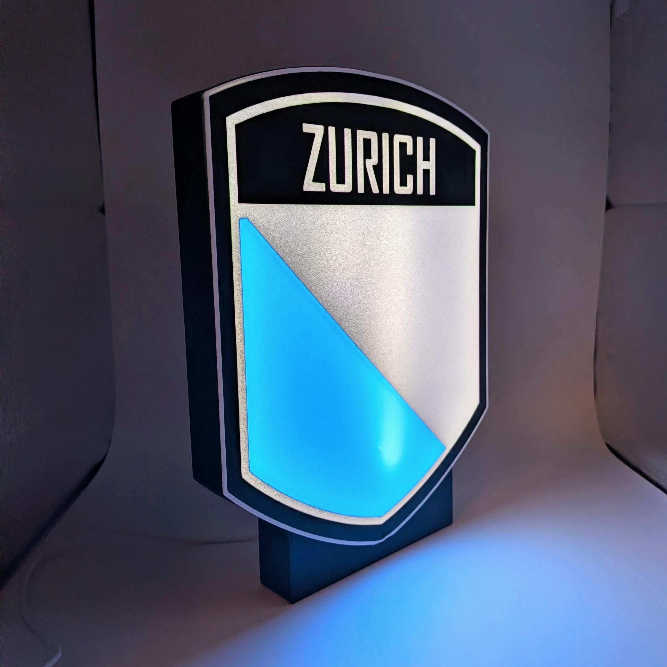 Lampada LED lightbox a scudo ZURICH con cornice nera e luce blu