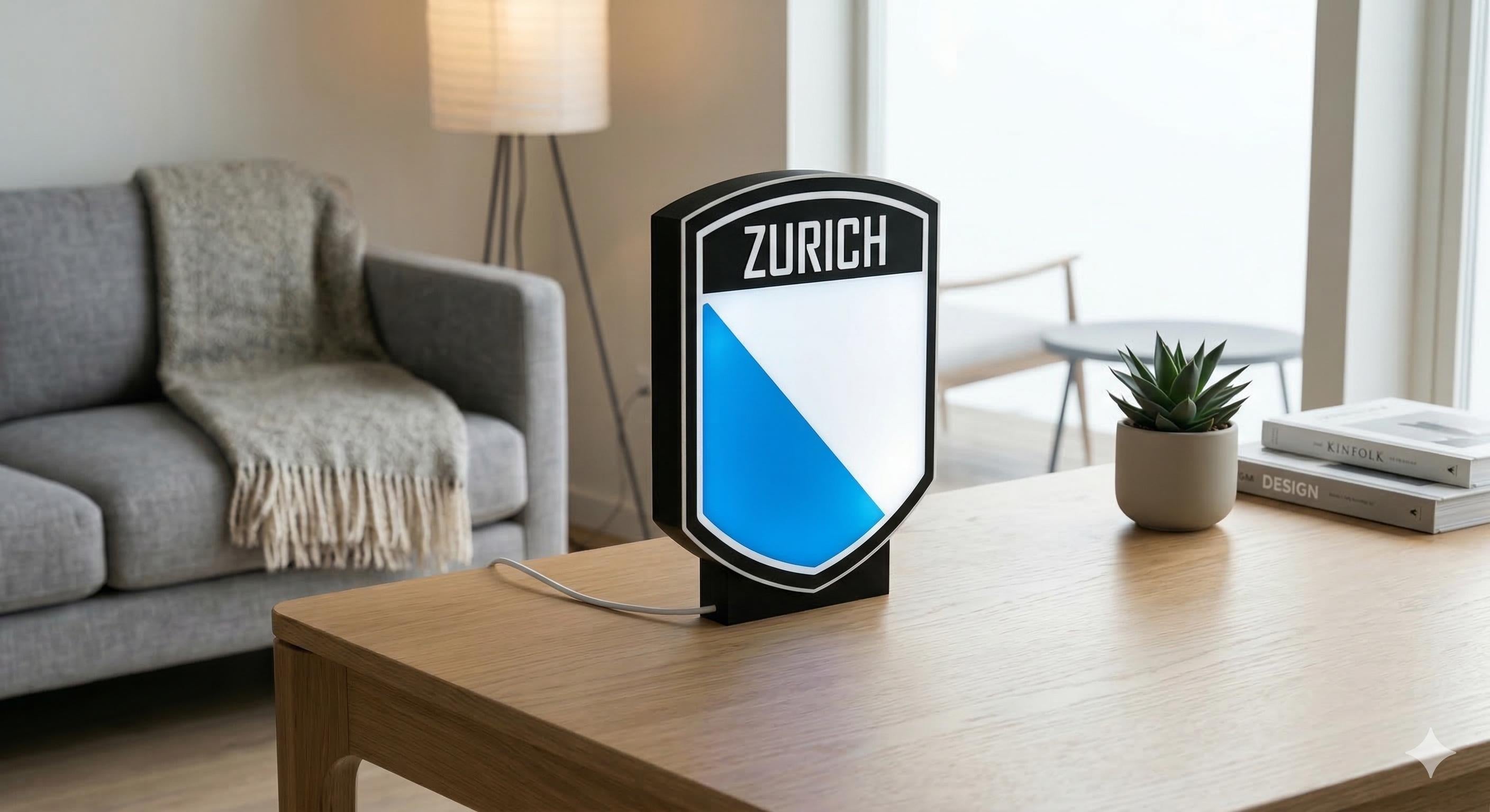 Lampada LED lightbox a scudo ZURICH su base, cornice nera e pannello blu