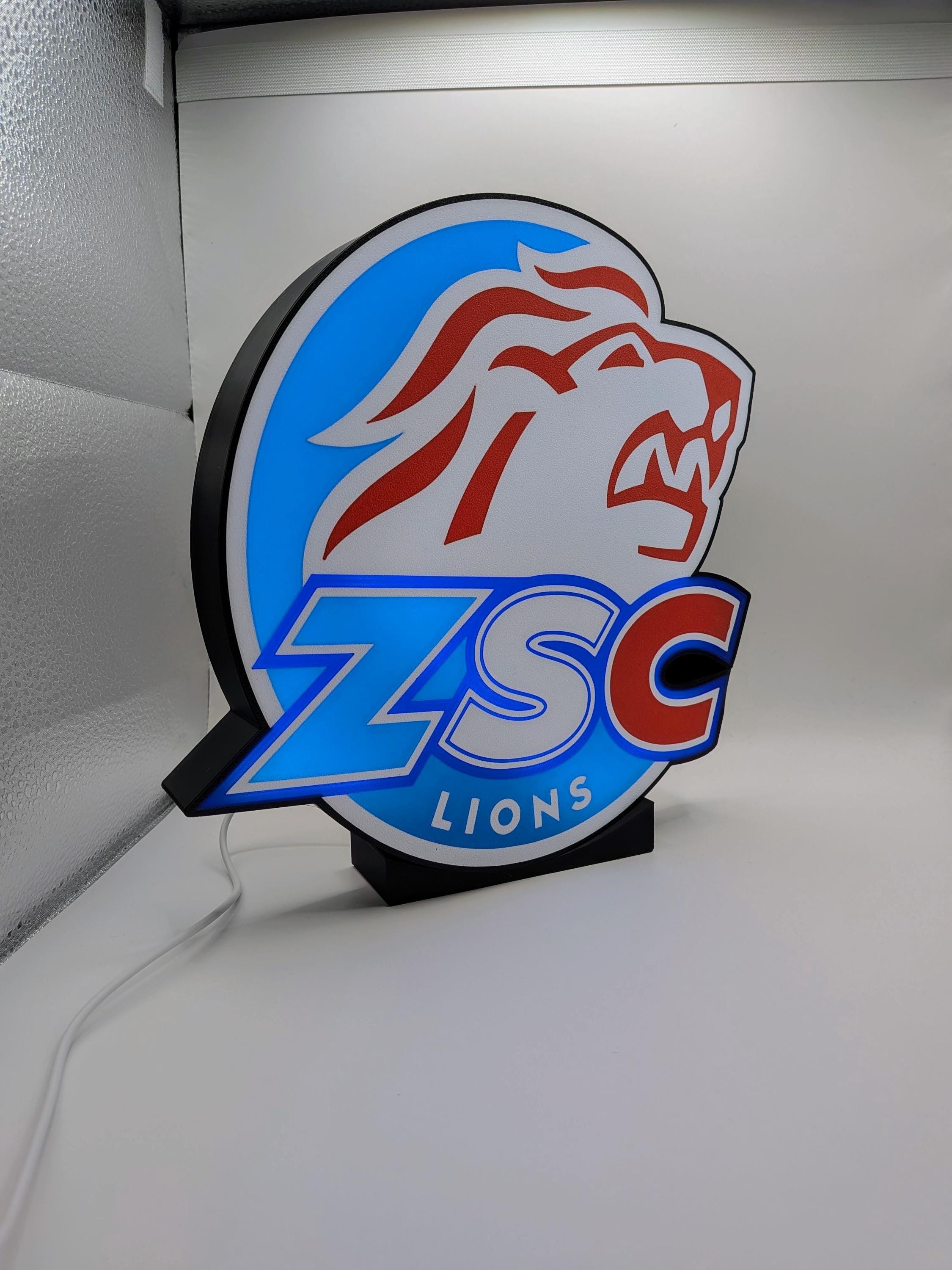 Lampada LED lightbox hockey ZSC Lions su supporto, logo blu e rosso